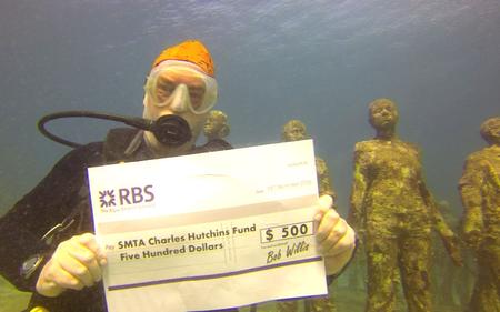 Recent SMTA International Best of Conference Award Winner, Bob Willis pledges half of his award to the Charles Hutchins Educational Grant while on a scuba trip